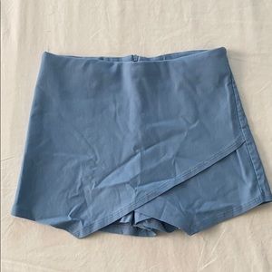 Over flap skort in red and baby blue